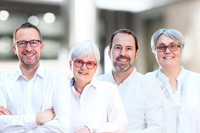 Unsere Consultants, Tobias Scheibl, Iris Lindemann, Hans van den Houdt und Astrid Nogaitzig